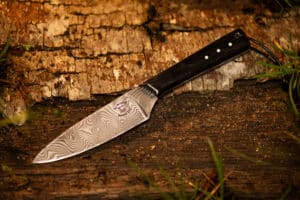 Compact fixed damascus knife